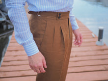 Load image into Gallery viewer, Cognac rust brown linen pleated trousers for men with high waist and side adjusters