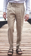 Laden Sie das Bild in den Galerie-Viewer, Double pleated Spence Bryson linen trousers with side adjusters and high rise, present wide double button waist as its sartorial touch.